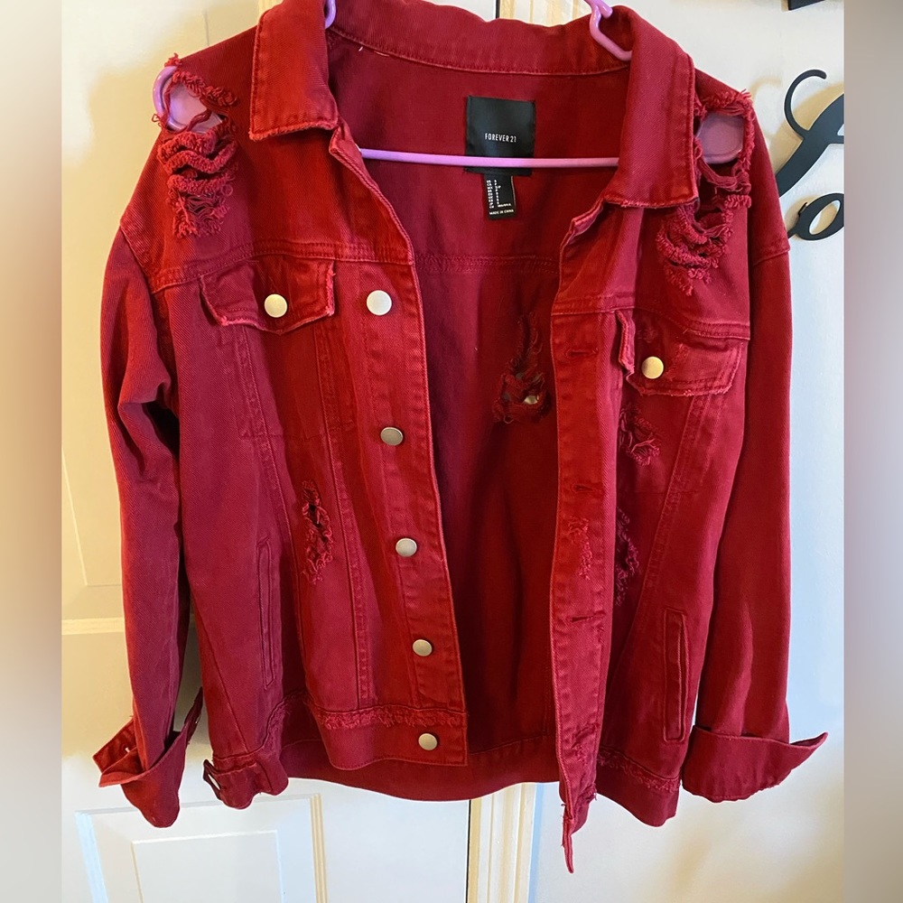 Distressed red denim jacket